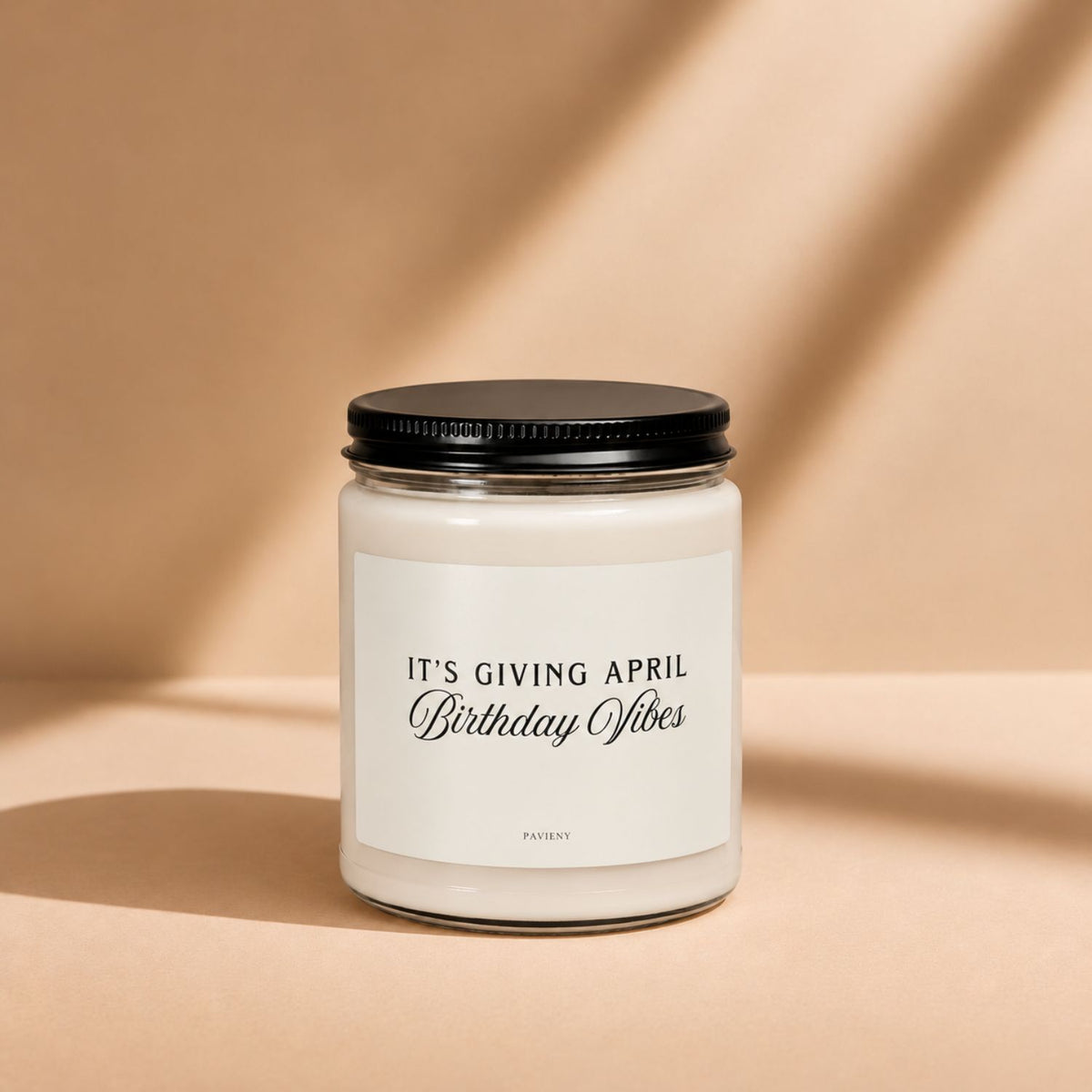 April Birthday Candle in a glass jar with its lid closed, a scented candle gift for April birthdays.