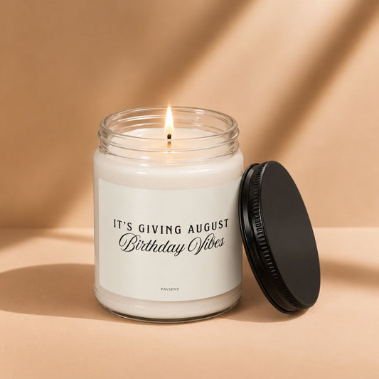 Lit August birthday scented candle in a glass jar, a thoughtful birthday gift for someone born in August.