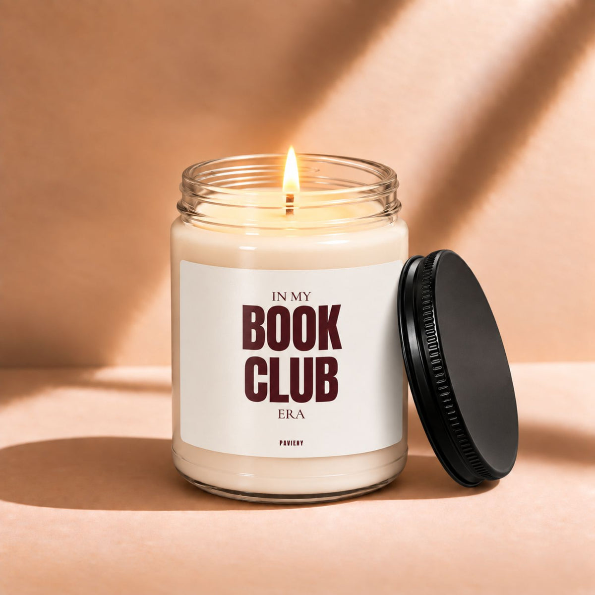 Lit Book Club scented candle creating a cozy atmosphere for reading and book discussions.