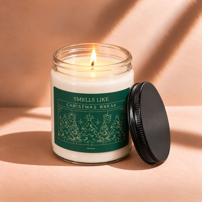 Lit 9oz Christmas Break scented soy candle with a warm flame, a fun and relaxing holiday gift.
