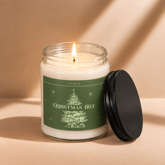 Lit 9oz Christmas Tree scented soy candle with a warm flame, a festive holiday gift for Christmas lovers.