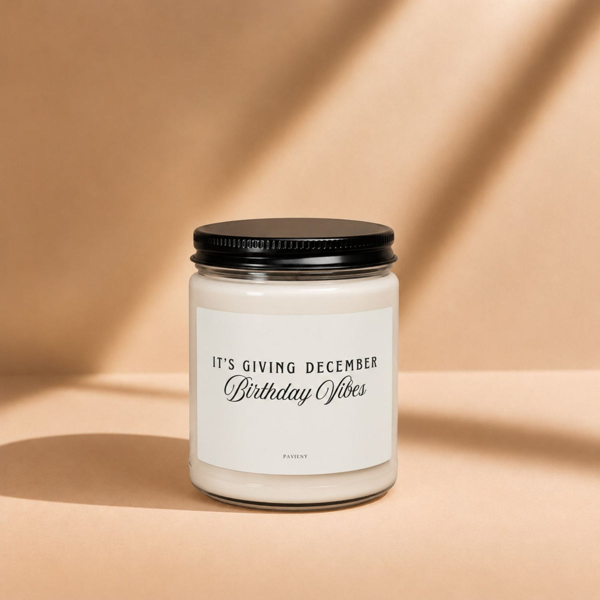 December Birthday Candle in a glass jar with its lid closed, a scented candle gift for December birthdays.