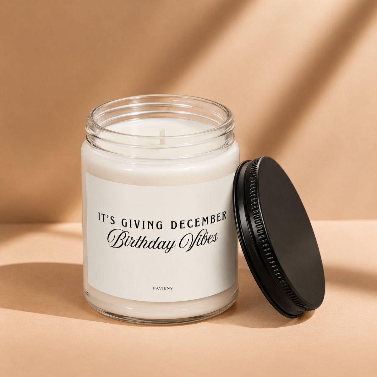 December Birthday Candle with the lid removed, showing the candle wax and label, a special birthday gift idea.
