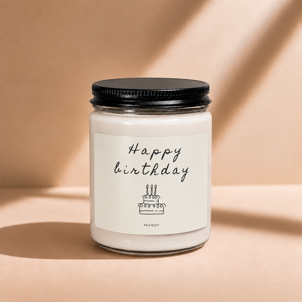 Closed 9oz Happy Birthday scented soy candle with a black lid, a cheerful birthday gift for someone special.