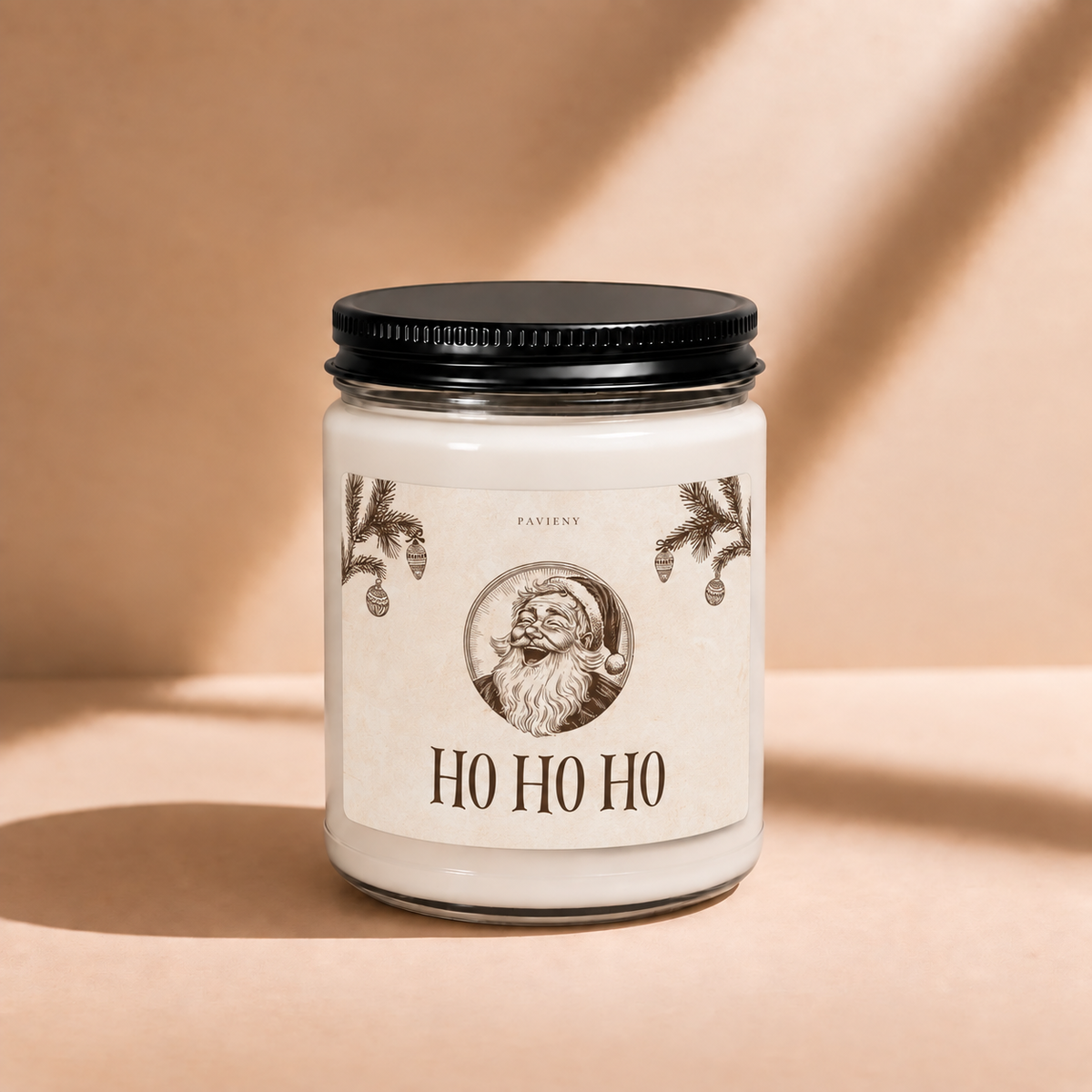 Closed 9oz Ho Ho Ho scented soy candle with a black lid, a fun Christmas gift for friends and family.