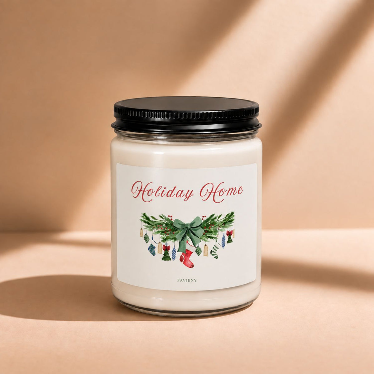 Front view of a 9oz scented candle featuring a cozy “Holiday Home” Christmas label.