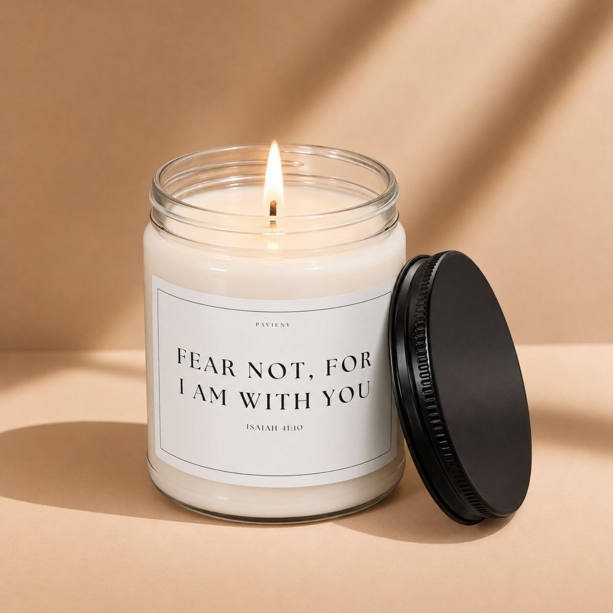 Lit Isaiah 41:10 candle by Pavieny in a glass jar, a Bible verse candle and faith-inspired Christian gift.