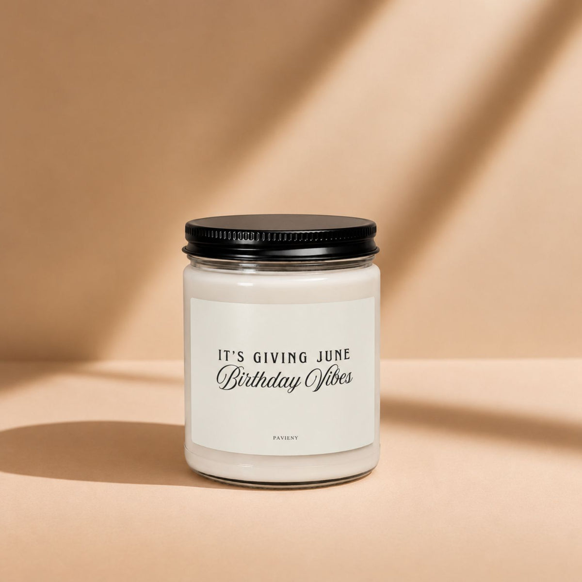 June Birthday Candle in a glass jar with its lid closed, a scented candle gift for June birthdays.