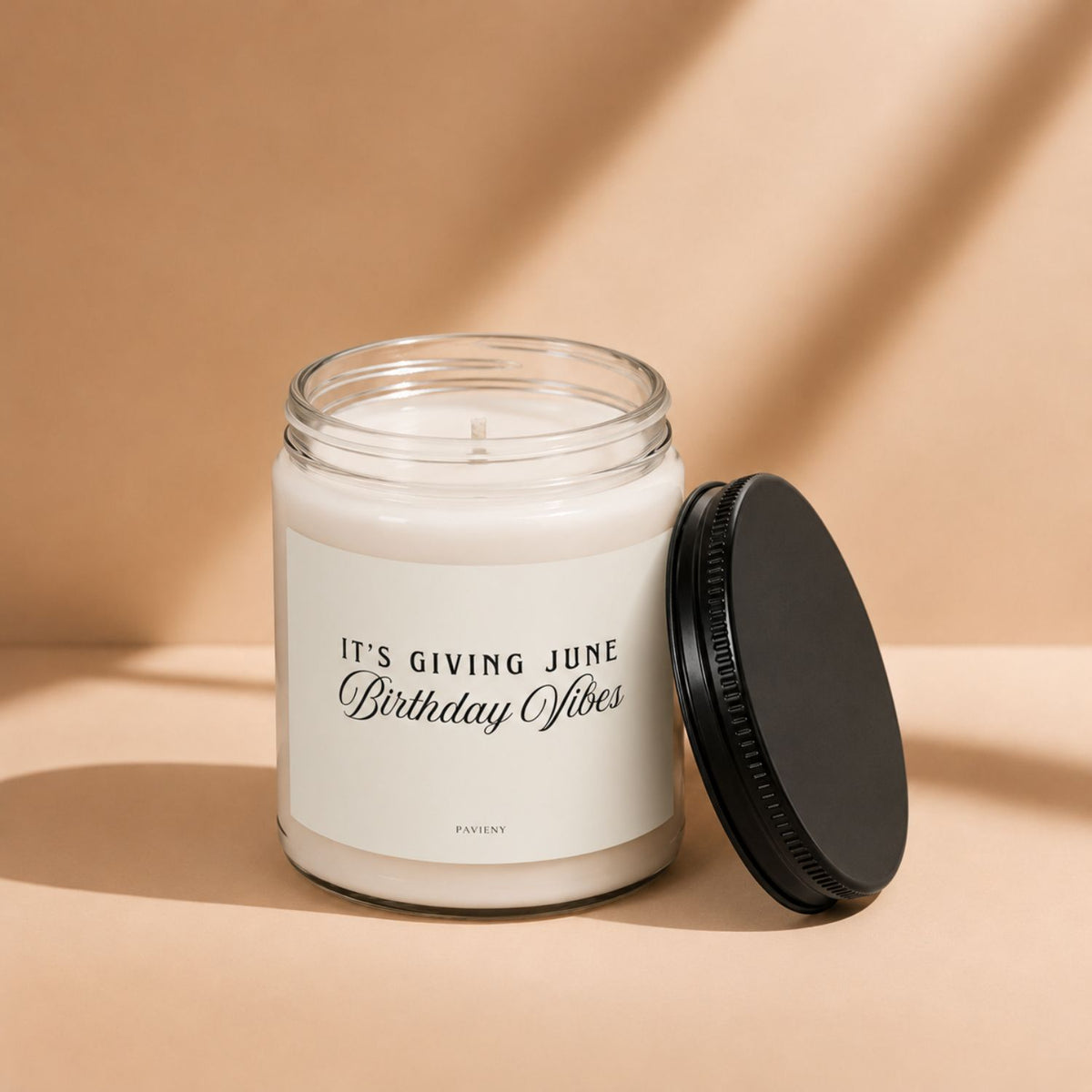 June Birthday Candle with the lid removed, showing the candle wax and label, a meaningful birthday gift idea.