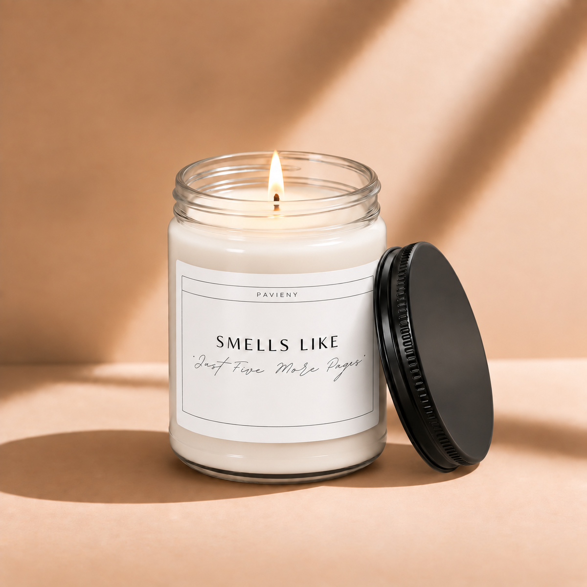 Lit 9oz Just Five More Pages scented soy candle with a warm flame, a cozy gift for book lovers and readers.
