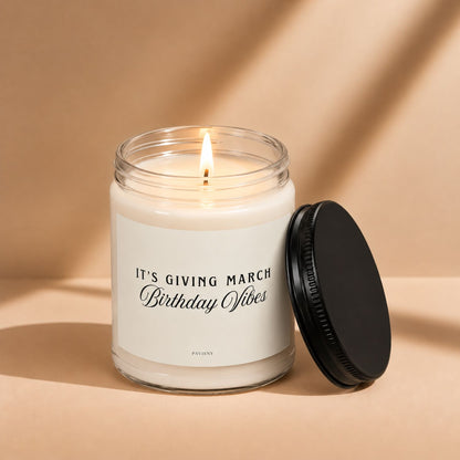 Lit March birthday scented candle in a glass jar, a thoughtful birthday gift for someone born in March.