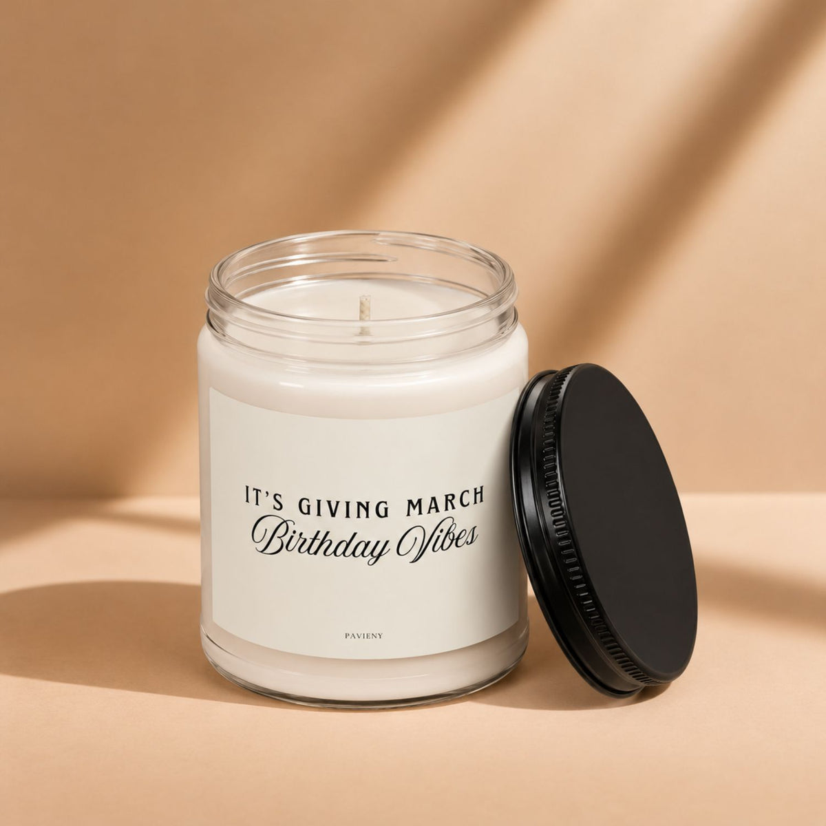 March Birthday Candle with the lid removed, showing the candle wax and label, a special birthday gift idea.