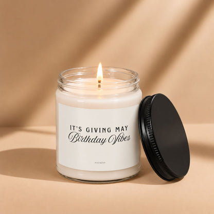 Lit May birthday scented candle in a glass jar, a thoughtful birthday gift for someone born in May.