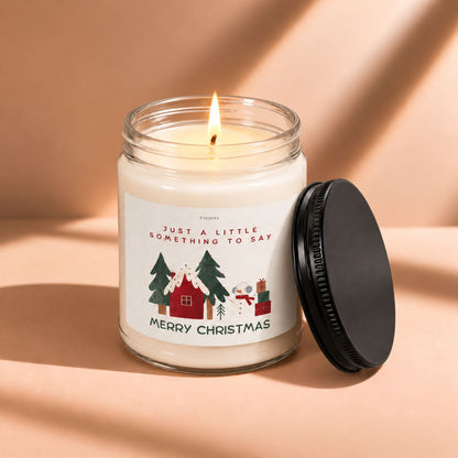 Lit Merry Christmas scented candle creating a warm and festive holiday atmosphere.