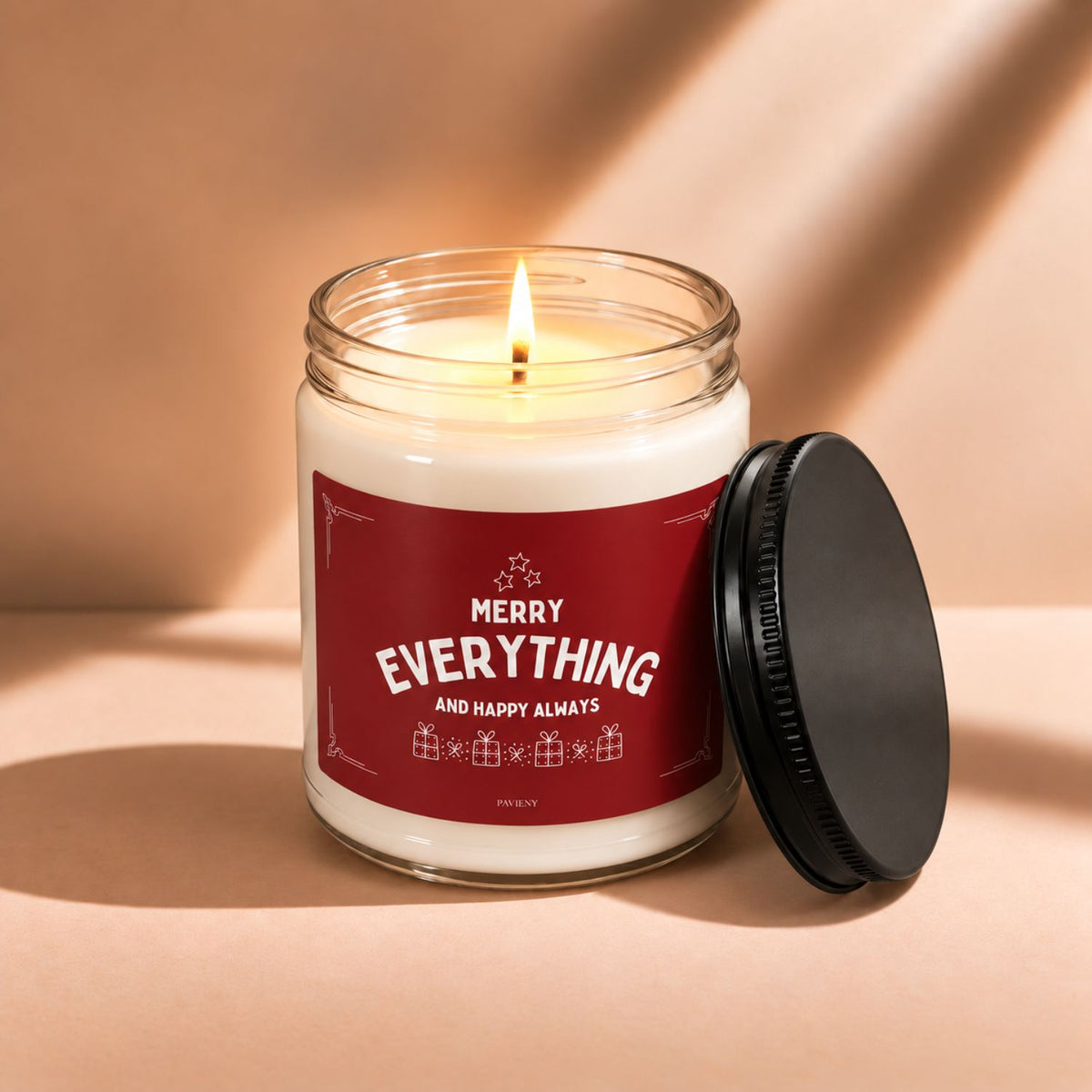 Lit Merry Everything scented candle creating a cheerful and cozy holiday atmosphere.