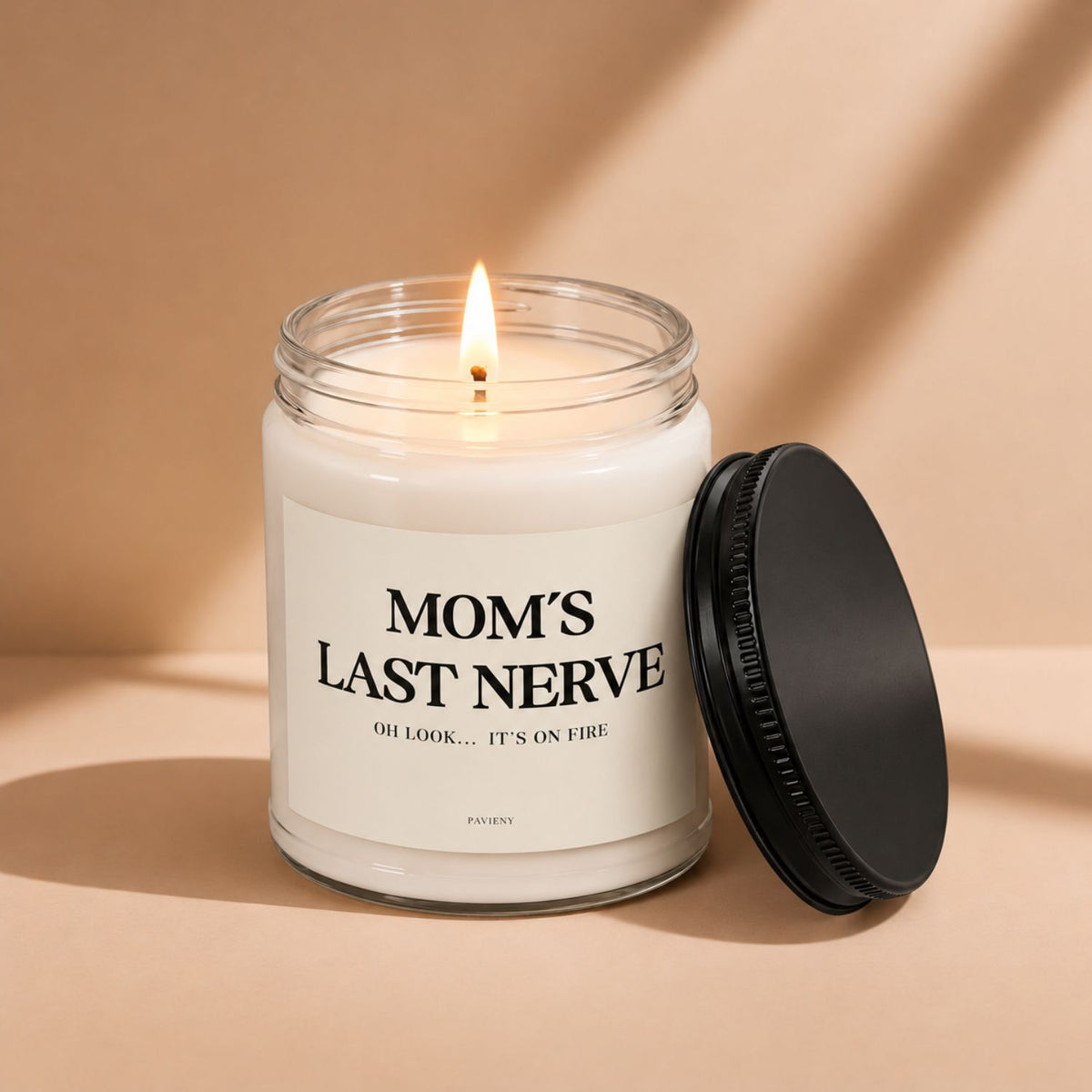 Lit Mom's Last Nerve scented candle in a glass jar, a funny candle gift for moms with a sense of humor.