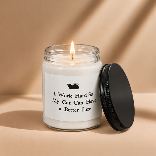 My Cat's Life funny scented candle lit in a clear glass jar, a unique gift for cat lovers by Pavieny