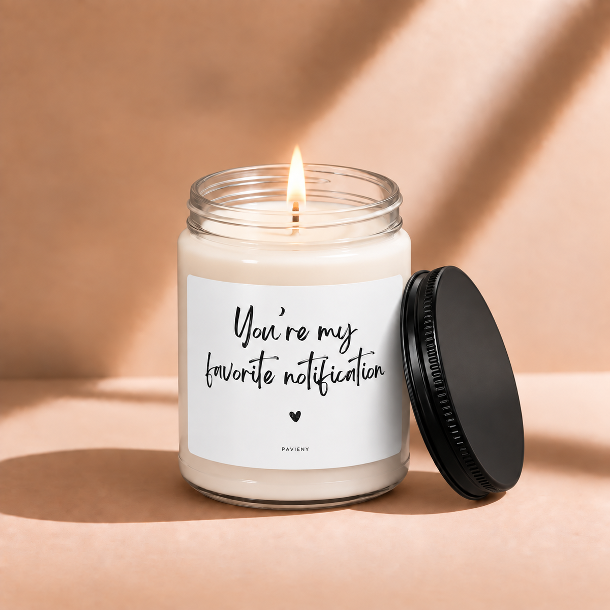 Lit 9oz My Favorite Notification scented soy candle with a warm flame, a sweet romantic gift for someone special.