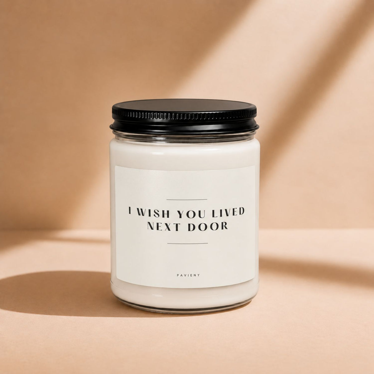 Next Door candle in a glass jar, a thoughtful scented candle gift for a neighbor.