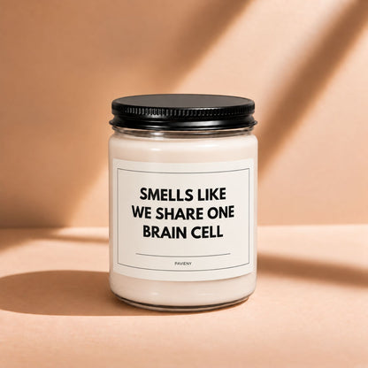 Closed 9oz One Brain Cell scented soy candle with a black lid, a humorous friendship gift.