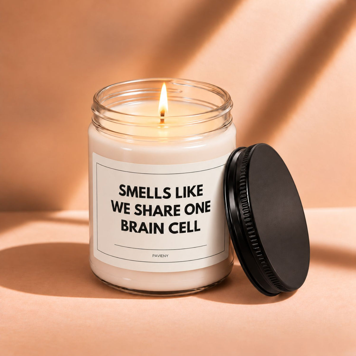 Lit 9oz One Brain Cell scented soy candle with a warm flame, a funny best friend gift.