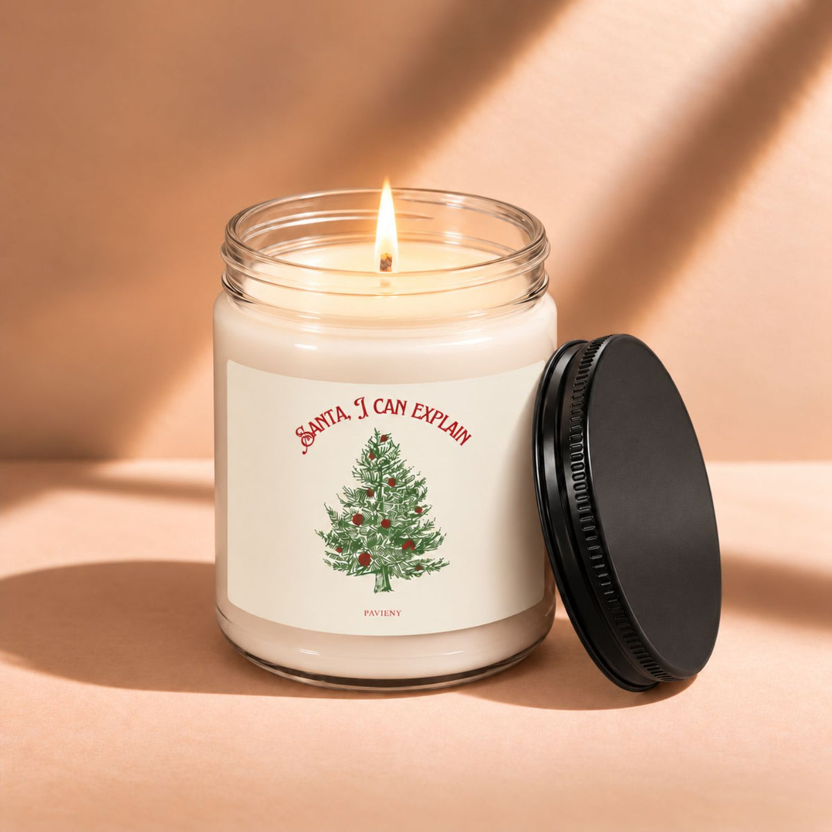 Lit 9oz Santa I Can Explain scented soy candle with a warm flame, a funny Christmas gift.
