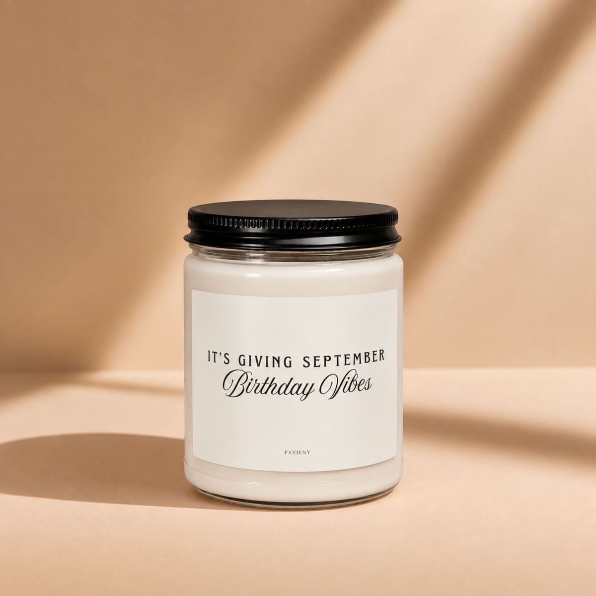 September Birthday Candle in a glass jar with its lid closed, a scented candle gift for September birthdays.