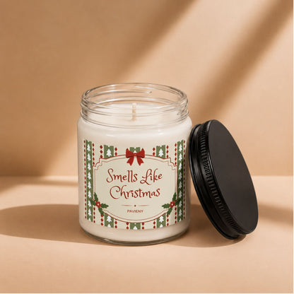 Open Smells Like Christmas candle by Pavieny showing the wax surface and cotton wick inside the glass jar.