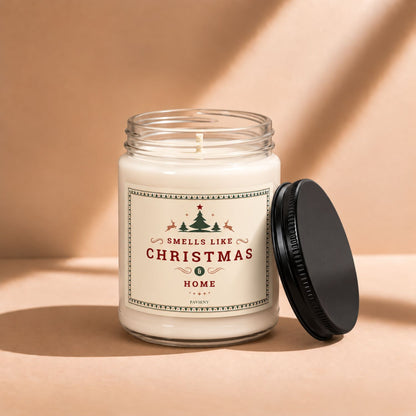 Open 9oz Smells Like Christmas scented candle with the black lid beside the glass jar.