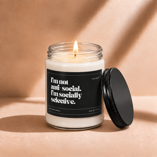 Lit 9oz Socially Selective scented soy candle with a warm flame, a funny gift for introverts and homebodies.