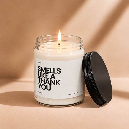 Thank You scented candle lit in a clear glass jar by Pavieny, a thoughtful thank you gift candle