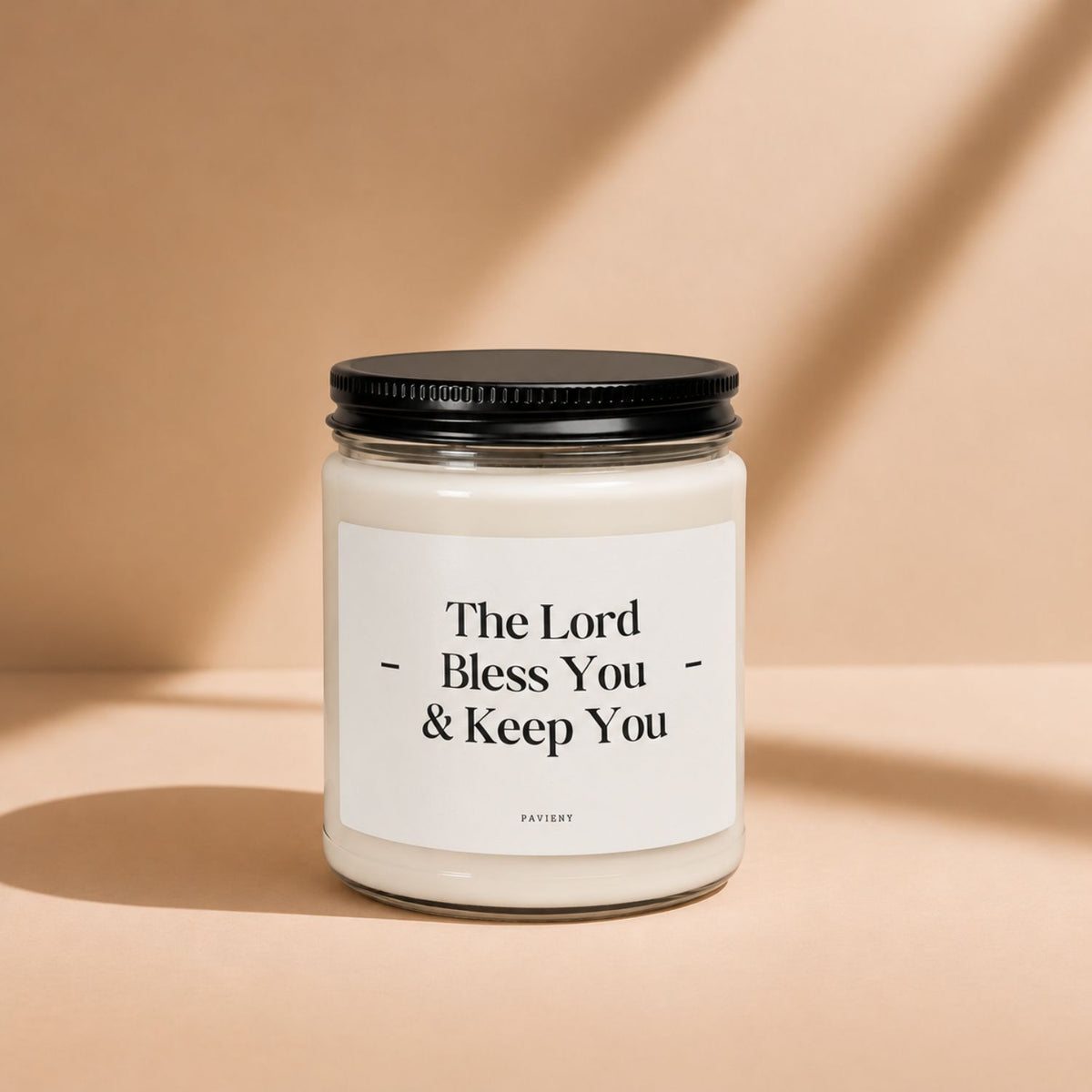 The Lord Bless You candle by Pavieny with its faith-inspired label on a closed glass jar, a Christian gift idea for believers.