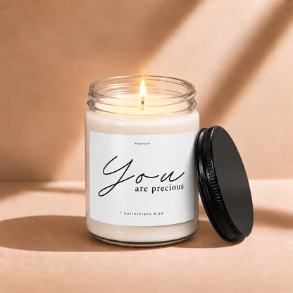 Lit 9oz You Are Precious scented soy candle with a warm flame, a thoughtful gift for someone special.