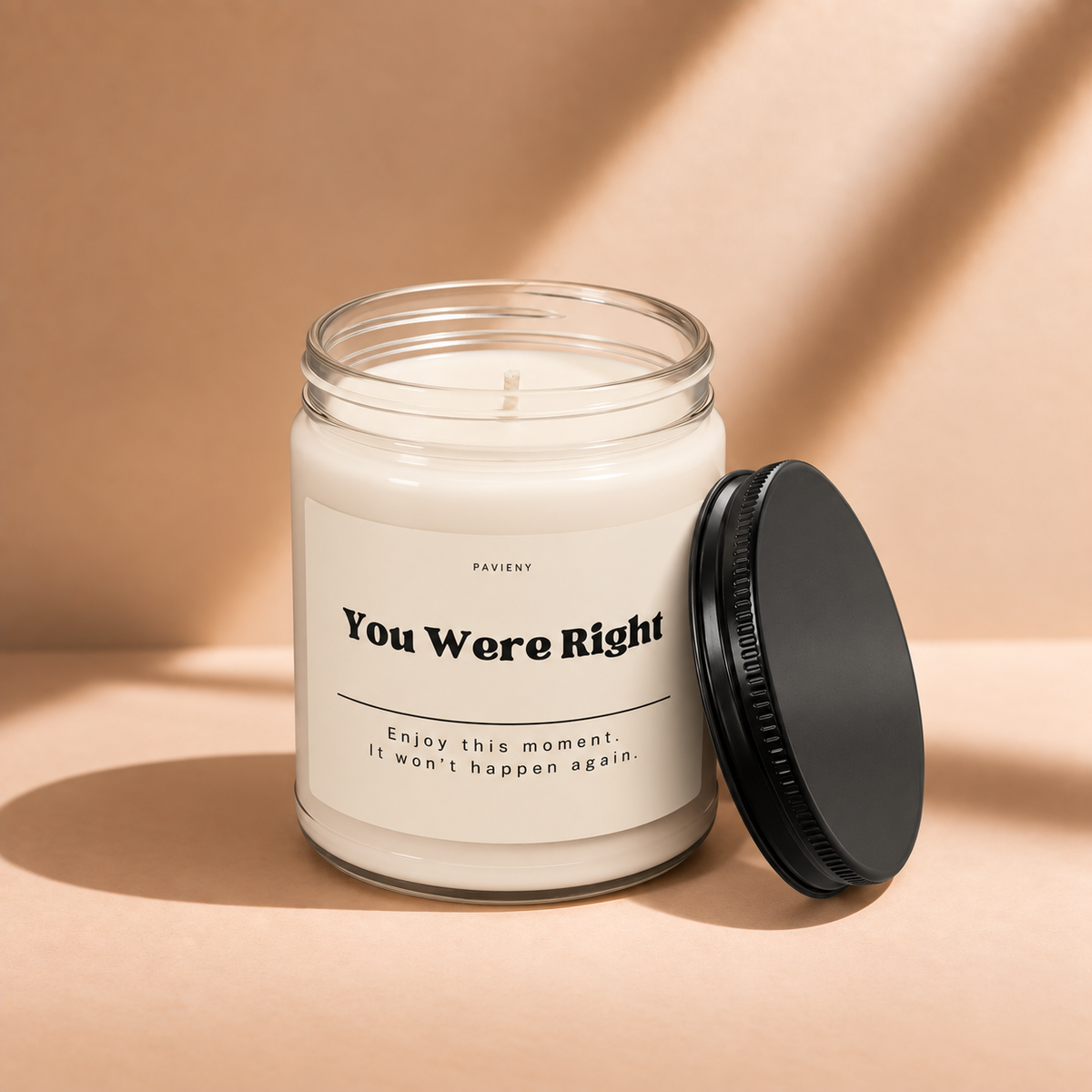 Open 9oz You Were Right scented soy candle with the black lid beside the clear glass jar.