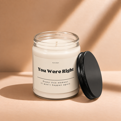 Open 9oz You Were Right scented soy candle with the black lid beside the clear glass jar.